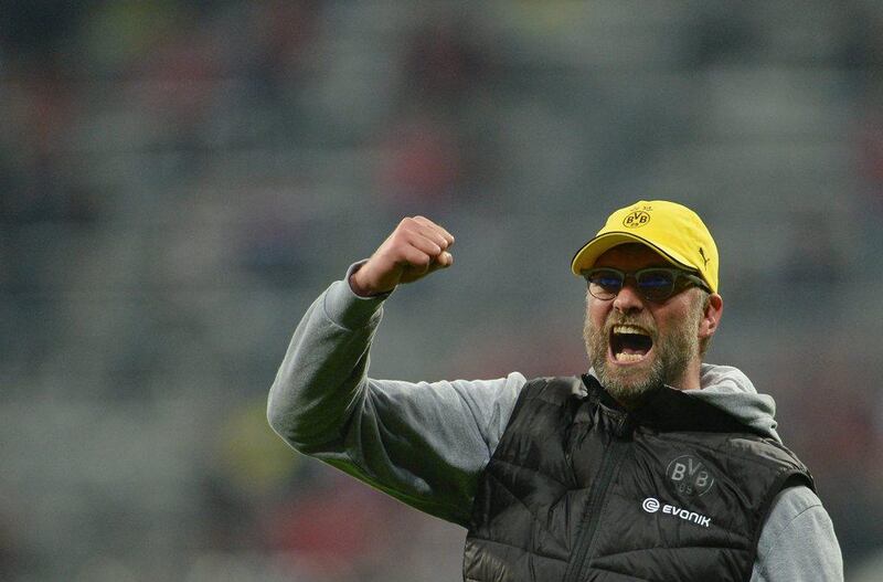 Borussia Dortmund coach Juergen Klopp celebrates after the penalty shootout against Bayern Munich to send his side to the DFB-Pokal Final on Tuesday. Peter Kneffel / EPA / April 28, 2015  