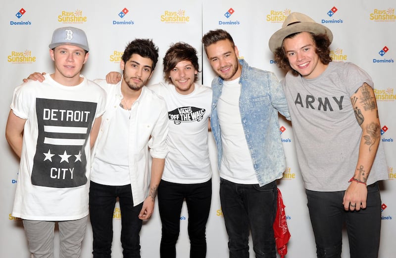 LONDON, ENGLAND - JUNE 08:  Zayn Malik, Niall Horan, Louis Tomlinson, Liam Payne and Harry Styles of One Direction pose for photographs at Wembley Arena as they made the wishes of 60 seriously ill children come true and met the children prior to performing at Wembley Stadium on June 8, 2014 in London, United Kingdom. The band are ambassadors for Rays of Sunshine, a children's charity which grants wishes for seriously ill children in the UK. www.raysofsunshine.org.uk  (Photo by Stuart C. Wilson/Getty Images for Rays of Sunshine)