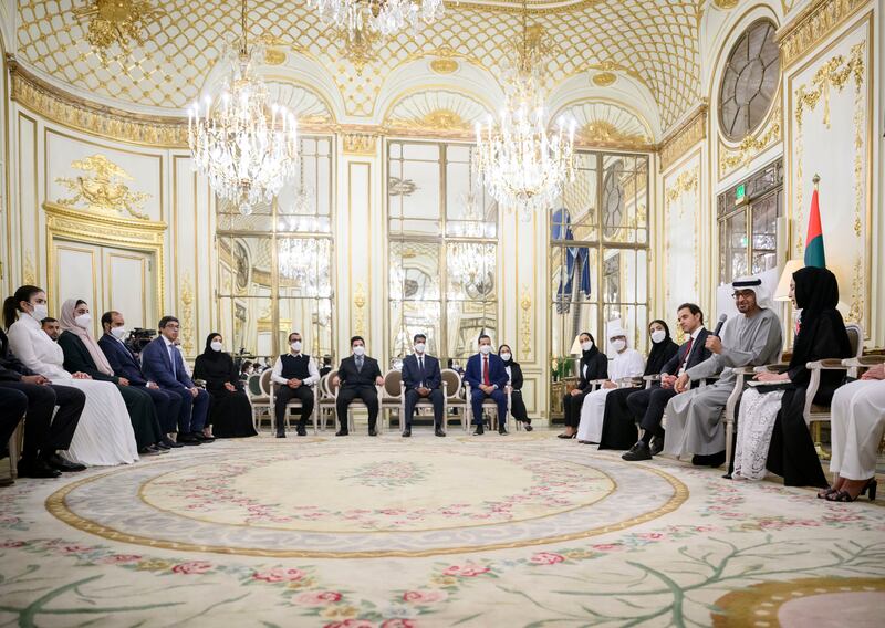 Sheikh Mohamed and Emirati students and doctors, along with Shamma bint Suhail Al Mazrouei, UAE Minister of State for Youth, right, Sheikh Hazza bin Zayed, third right, and Sheikh Mansour bin Zayed, UAE Deputy Prime Minister and Minister of the Presidential Court, fourth left.