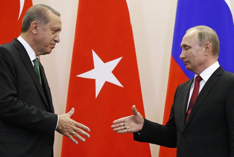 Russian President Vladimir Putin, right, and Turkish President Recep Tayyip Erdogan  following their meeting in the Russian Black Sea resort of Sochi, Russia, on Wednesday, May 3, 2017 to discuss the war in Syria.  Alexander Zemlianichenko / AP 