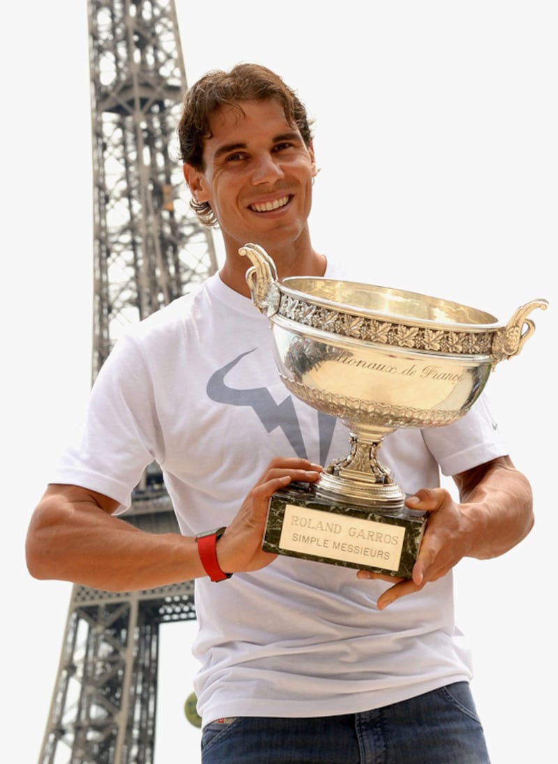 14) Rafael Nadal wins a fifth successive Roland Garros title at the 2014 French Open. AFP
