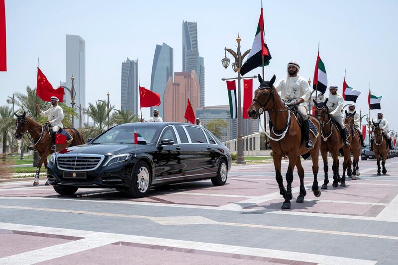 ABU DHABI, UNITED ARAB EMIRATES - July 20, 2018: Members of the UAE Armed Forces Cavalry Division escort HE Xi Jinping, President of China (in vehicle), upon his arrival at the Presidential Palace. 

( Hamad Al Mansoori for Crown Prince Court - Abu Dhabi )