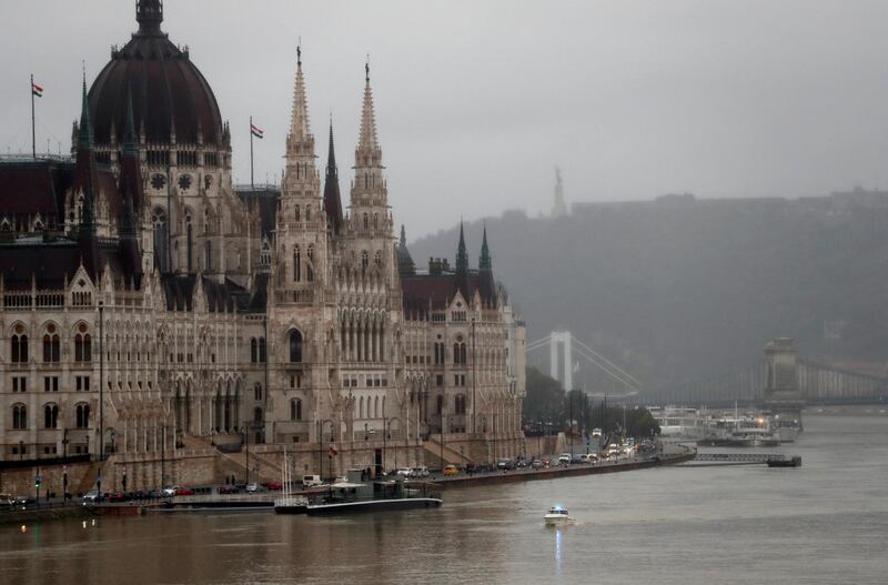 A police boat is seen on Danube river in front of the Hungarian Parliament in Budapest, Hungary, May 30, 2019. REUTERS/Bernadett Szabo