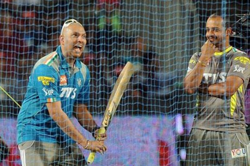 Yuvraj Singh has a go at the Pune Warriors nets session but will not be in action for a few months.