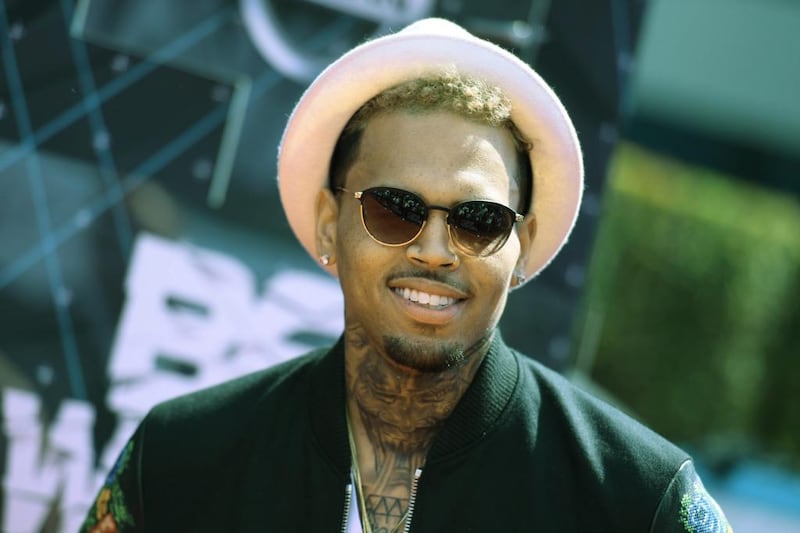 Chris Brown won't be allowed to tour Australia because of his prior conviction against Rihanna. Richard Shotwell / Invision / AP file