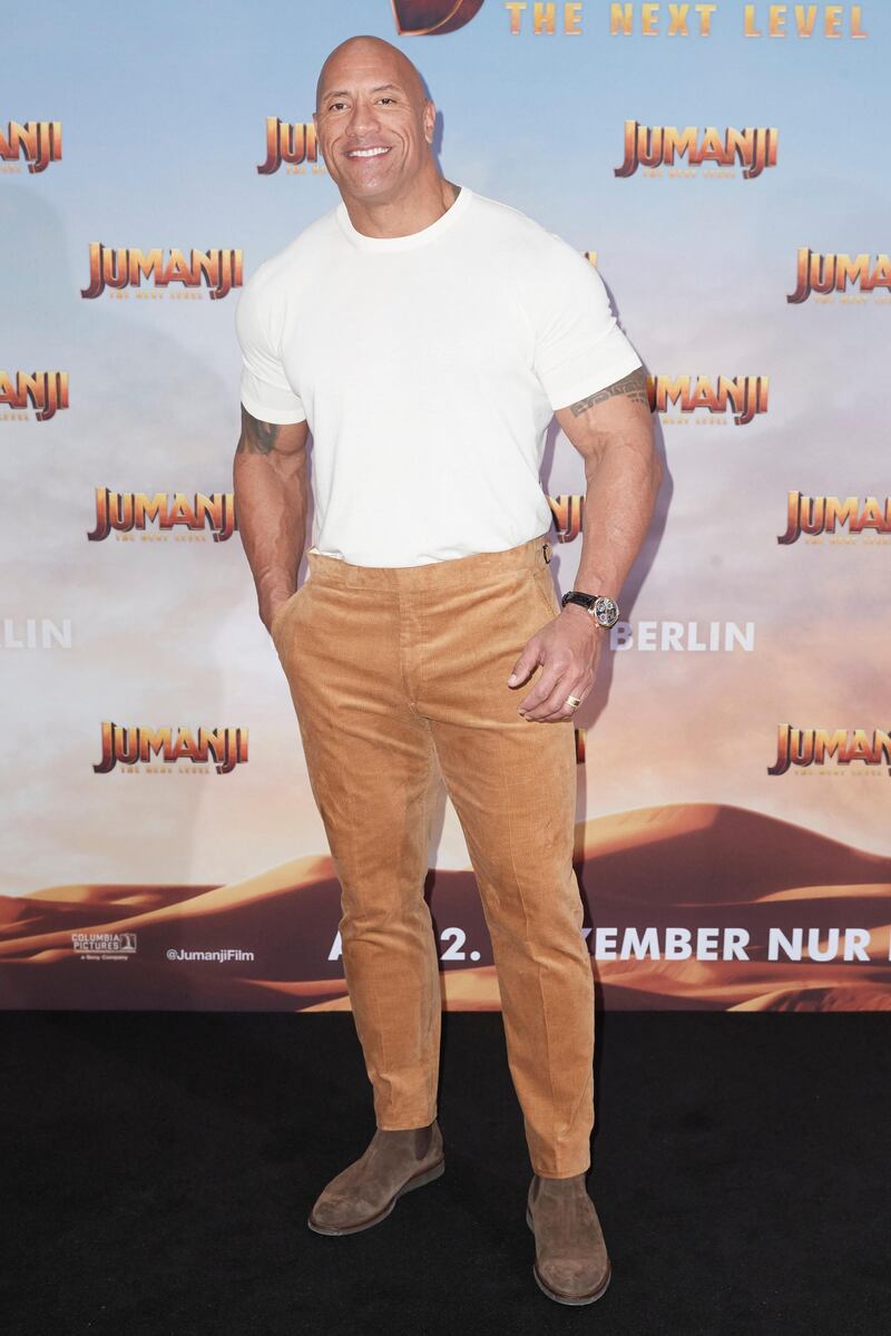 BERLIN, GERMANY - DECEMBER 04: Dwayne Johnson poses during the press junket for JUMANJI: THE NEXT LEVEL at Hotel Adlon on December 04, 2019 in Berlin, Germany. (Photo by Sebastian Reuter/Getty Images for Sony Pictures)