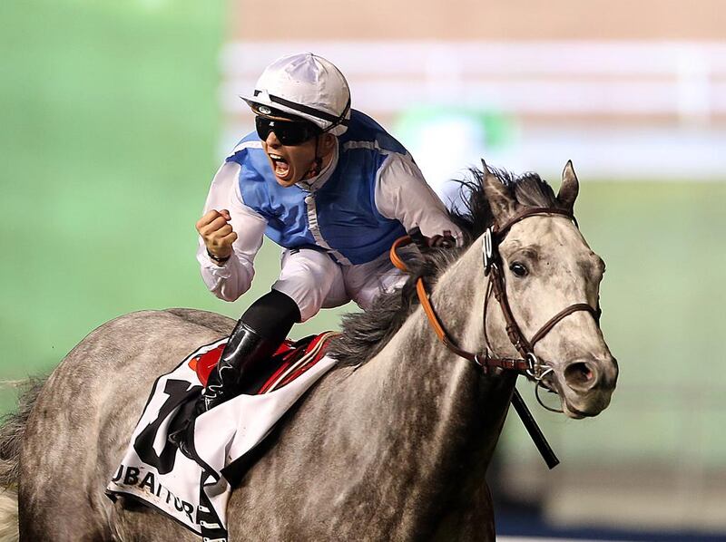 Jockey Maxime Guyon riding Solow wins the DP World during the Dubai World Cup at the Meydan Racecourse in Dubai. ( Satish Kumar / The National )
