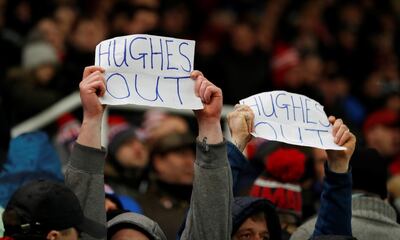 Soccer Football - Premier League - Stoke City vs Newcastle United - bet365 Stadium, Stoke-on-Trent, Britain - January 1, 2018   Stoke fans with banners for Stoke City manager Mark Hughes   Action Images via Reuters/Carl Recine    EDITORIAL USE ONLY. No use with unauthorized audio, video, data, fixture lists, club/league logos or "live" services. Online in-match use limited to 75 images, no video emulation. No use in betting, games or single club/league/player publications.  Please contact your account representative for further details.