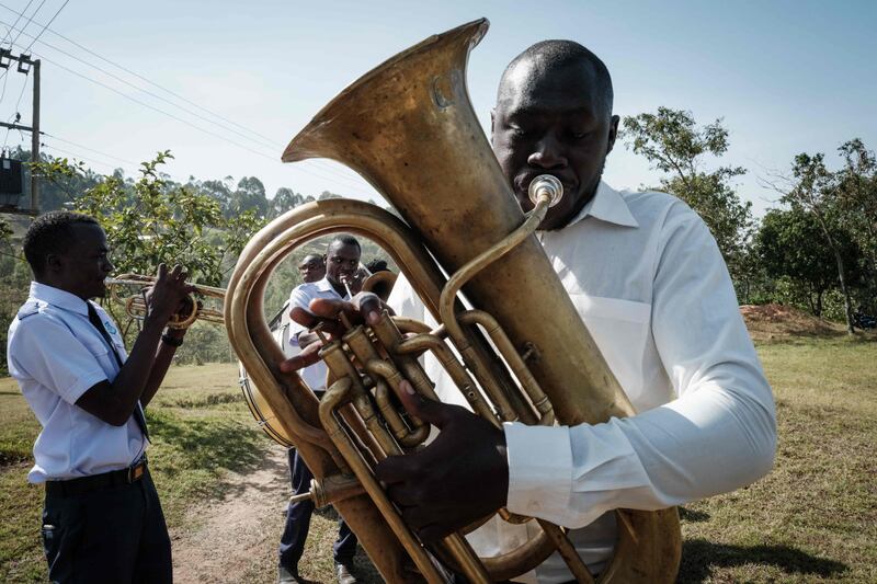 A brass band plays as the extension of the world’s first malaria vaccine is promoted in Gisambai, Kenya. AFP