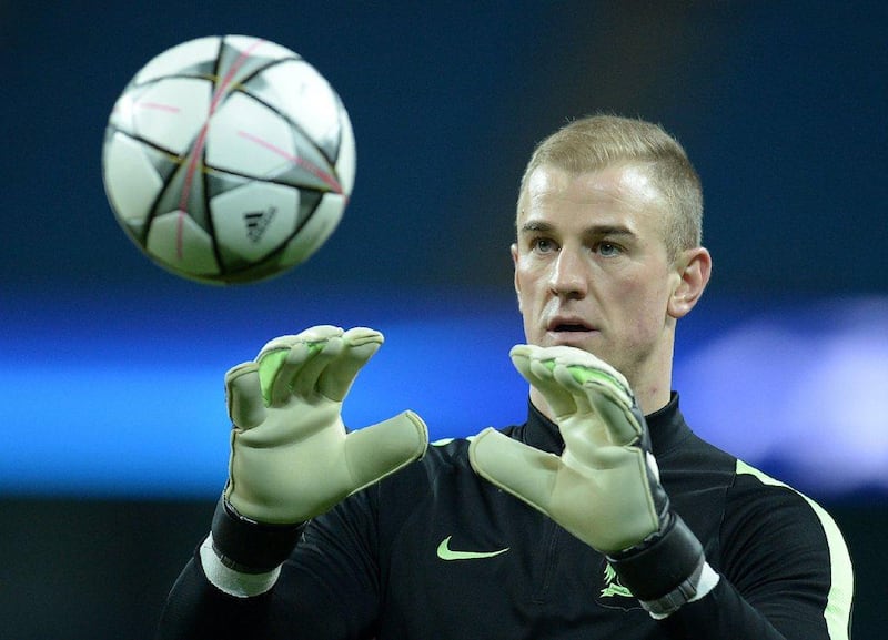 Manchester City’s English goalkeeper Joe Hart warms up ahead of a Uefa Champions League last 16, second leg football match between Manchester City and Dynamo Kiev at the Etihad Stadium in Manchester, north west England, on March 15, 2016. AFP / OLI SCARFF