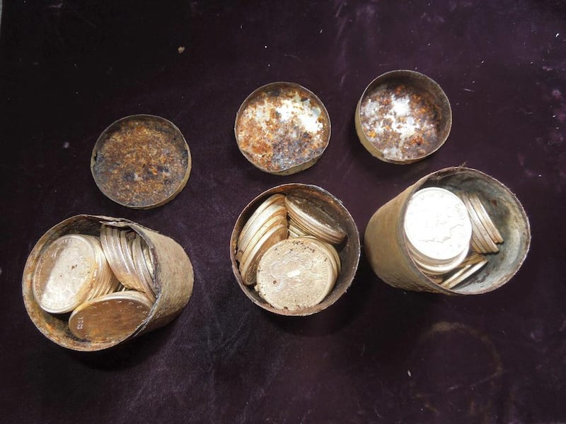 Pots containing 19th century gold coins were part of the treasure trove.   Kagin’s Inc / Reuters