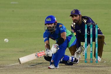 Multan Sultans' Mohammad Rizwan (L) plays a shot during the Pakistan Super League (PSL) T20 cricket match between Quetta Gladiators and Multan Sultans at the National Stadium in Karachi on March 3, 2021. (Photo by Asif HASSAN / AFP)