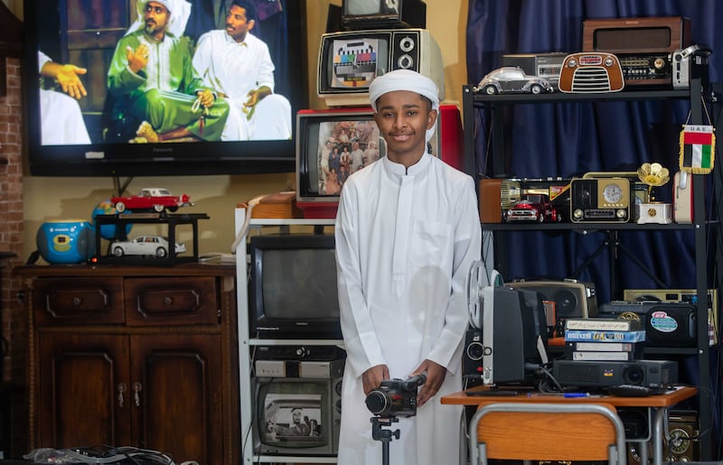 Juma Mubarak Al Ali with his collection of vintage electronics in his family home in Umm Al Quwain.  Leslie Pableo for The National