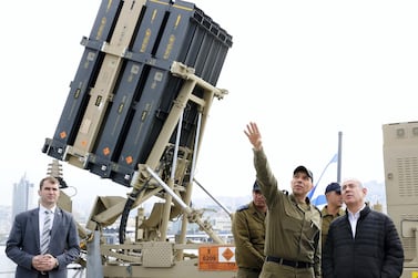 Israel Prime Minister Benjamin Netanyahu views a naval Iron Dome defence system, installed on a Lahav Class corvette of the Israeli Navy, in 2019. AP Photo