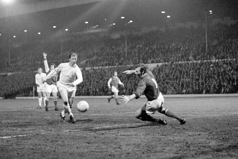 Leeds United's Jack Charlton scores past Arsenal's Bob Wilson at Elland Road. PA