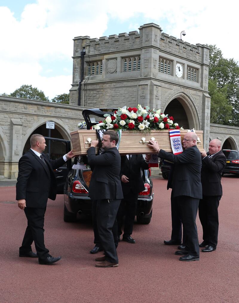 The coffin of British football legend Jack Charlton is carried into the West Road Crematorium in Newcastle on Tuesday. AFP