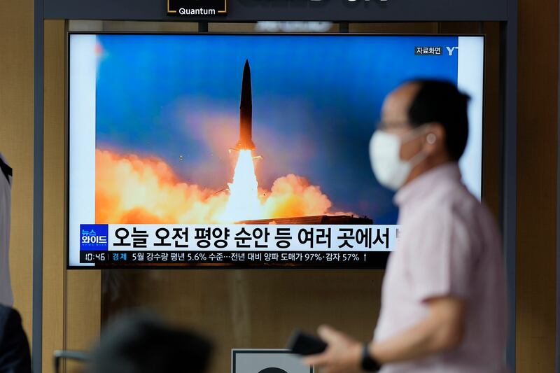 A news report about the latest North Korean missile launch is broadcast at a train station in Seoul, South Korea. AP