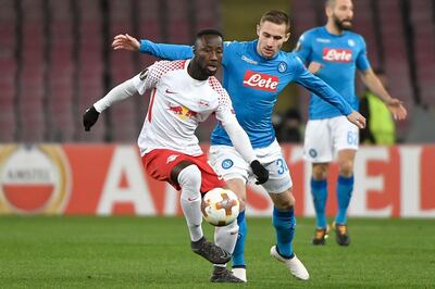 Leipzig's Guinean midfielder Naby Keita (L) vies for the ball with Napoli's midfielder Marko Rog during the UEFA Europa league football match between Napoli and Leipzig, on February 15, 2018 at San Paolo stadium in Naples.  / AFP PHOTO / Andreas SOLARO