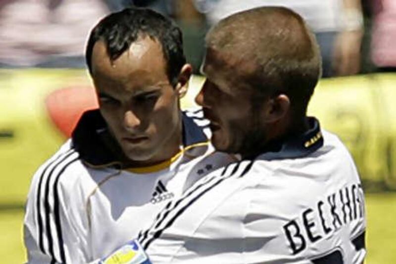 Landon Donovan, left, and David Beckham may be teammates with Los Angeles Galaxy, but they will both be in the UAE to prove their worth as Donovan aims to extend his time with Bayern Munich.