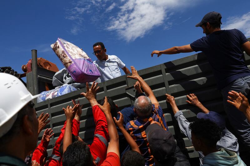 Survivors in Talat N'Yaaqoub receive much-needed aid after the earthquake that struck Morocco. Reuters