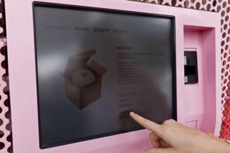 The automated cupcake dispenser, as pioneered by Sprinkles. Damian Dovarganes / AP