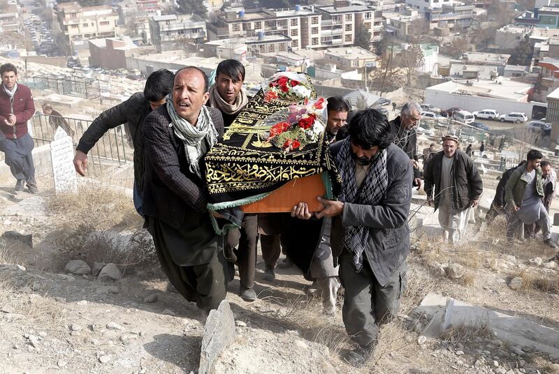 epa06479949 People attend the funeral of one of the victims of a suicide bomb attack, in Kabul, Afganistan, 28 January 2018. The death toll climbed to 95 while 158 were injured in the massive Taliban car-bomb attack in Sadarat Square, downtown Kabul, according to Afghan Ministry of Health. The Taliban resorted to an ambulance loaded with explosives to carry out the attack in a busy commercial area near the former Interior Ministry building and a facility of the National Directorate of Security (NDS).  EPA/HEDAYATULLAH AMID