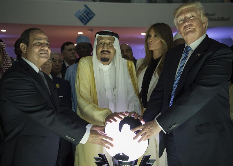 A handout picture provided by the Saudi Royal Palace on May 21, 2017 shows US President Donald Trump (R) and US First lady Melania Trump (2nd R), posing for a picture with Egyptian President Abdel Fattah el-Sisi (L) and Saudi Arabia's King Salman bin Abdulaziz al-Saud during the inauguration of the Global Center for Combating Extremist Ideology "Etidal" in Riyadh. (Photo by BANDAR AL-JALOUD / Saudi Royal Palace / AFP) / RESTRICTED TO EDITORIAL USE - MANDATORY CREDIT "AFP PHOTO / SAUDI ROYAL PALACE / BANDAR AL-JALOUD" - NO MARKETING - NO ADVERTISING CAMPAIGNS - DISTRIBUTED AS A SERVICE TO CLIENTS