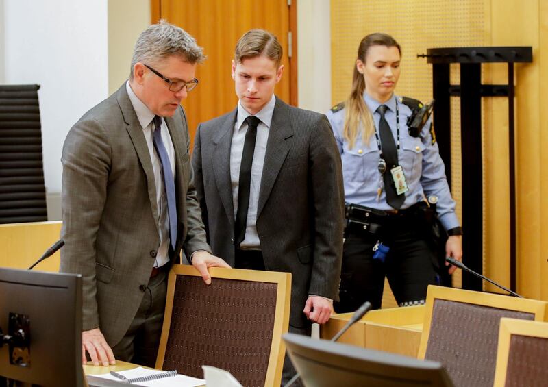 22-year-old Philip Manshaus (C), who faces terror charges, appears with his lawyer Audun Beckstrom (L) for a court session in Oslo on January 6, 2020, to extend his pretrial detention. Norway OUT
 / AFP / NTB Scanpix / Vidar Ruud
