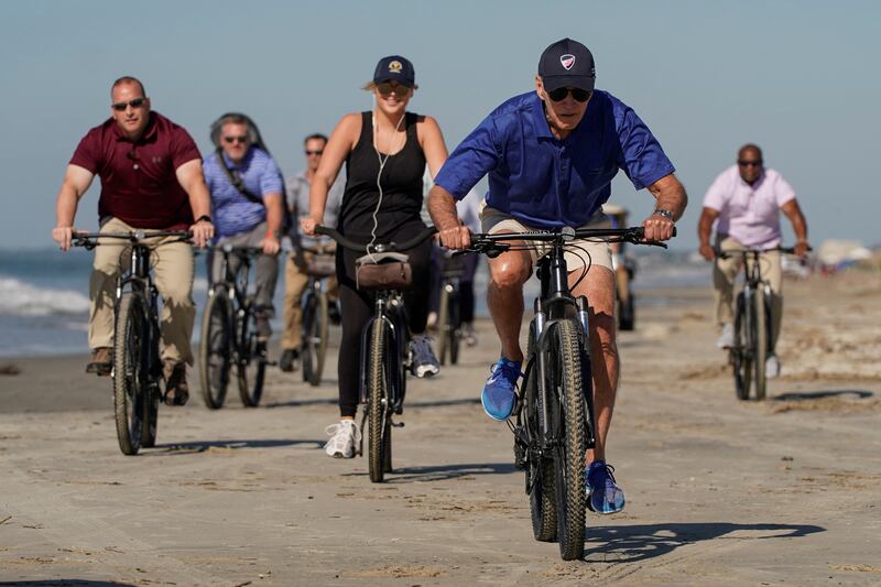 Mr Biden is an avid bike rider. Reuters