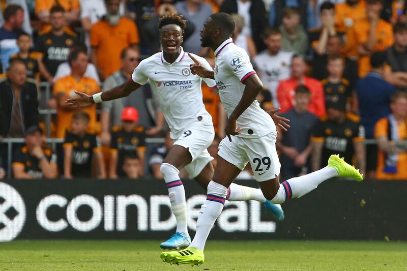 Chelsea's Fikayo Tomori celebrates his opening goal against Wolves with teammate Tammy Abraham. AFP