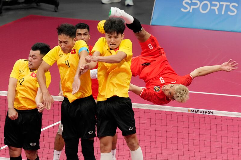 Action from Indonesia v Vietnam in the men's sepaktakraw match at the Asian Games in Jinhua, China. AP