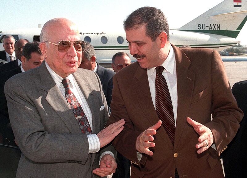 Fayez Tarawneh (R),the Jordanian Foreign Minister, greets Esmat Abdel-Meguid, the Arab League Secretary General, at Amman airport in February 1998. AFP