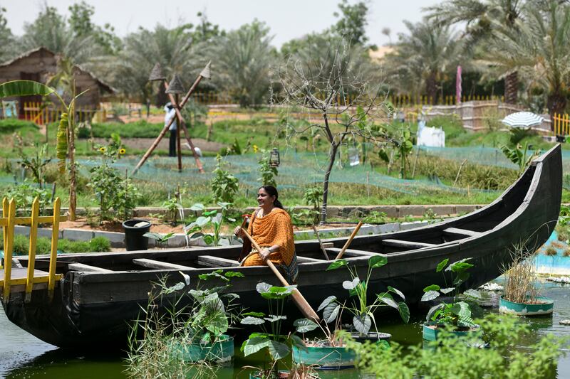 A woman enjoys  a nostalgic Kerala experience at Green Heaven Farm and Camping in Sharjah.