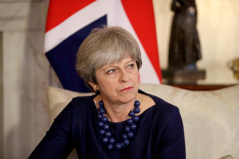 FILE PHOTO: Britain's Prime Minister Theresa May meets Spain's Prime Minister Mariano Rajoy at 10 Downing Street, London, December 5, 2017. REUTERS/Matt Dunham/Pool/File Photo