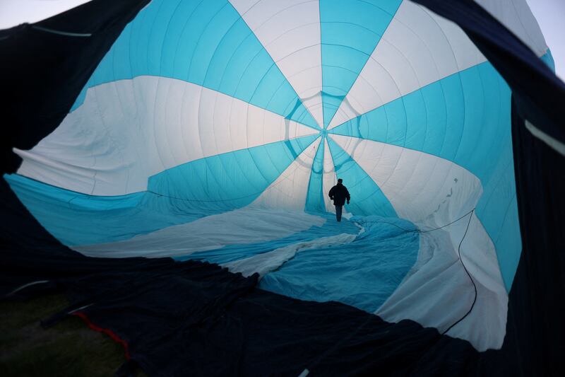 A hot air balloon is inflated in preparation for an exhibition in Santiago, the capital of Chile. Reuters