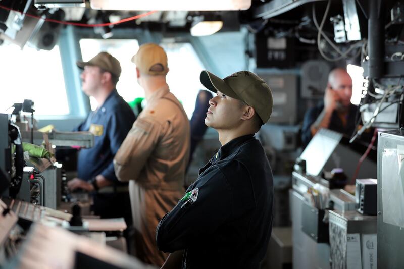 US sailors man the bridge.