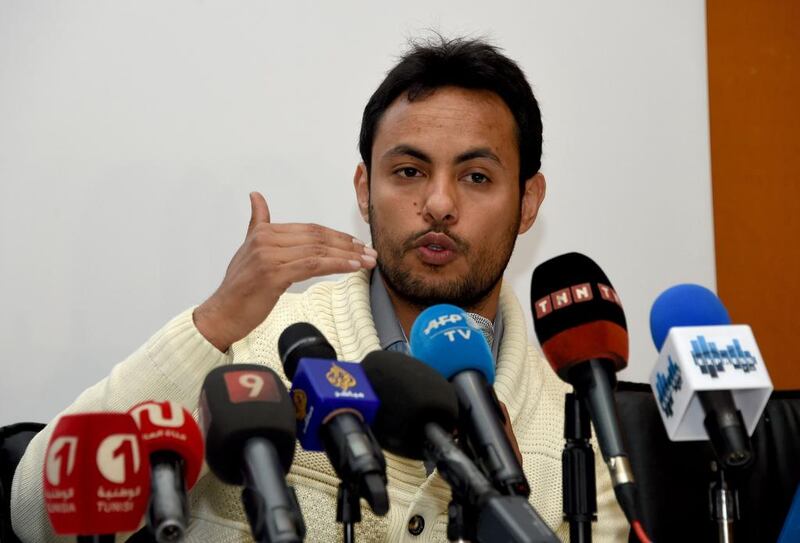 Achraf Aouadi, director of the youth-led, anti-corruption NGO "I-Watch" (Ana Yakedh) gives a press conference in the capital Tunis on May 3, 2016. Fethi Belaid/AFP

