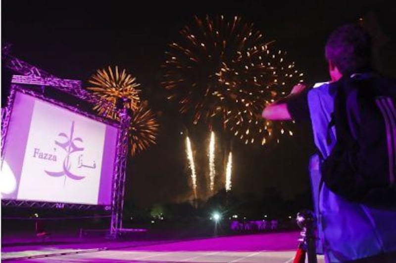 Fireworks mark the opening of the first special needs athletics grand prix in Dubai.  Lee Hoagland / The National
