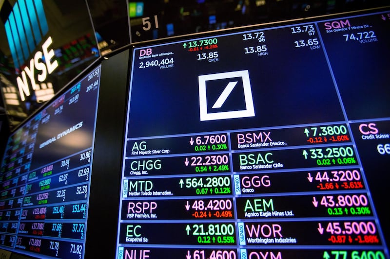 A monitor displays Deutsche Bank AG signage on the floor of the New York Stock Exchange (NYSE) in New York, U.S., on Friday, April 27, 2018. U.S. stocks were mixed as euphoria from better-than-forecast earnings reports faded with investors contemplating the implications of higher interest rates in an economy that may be cooling. Photographer: Michael Nagle/Bloomberg