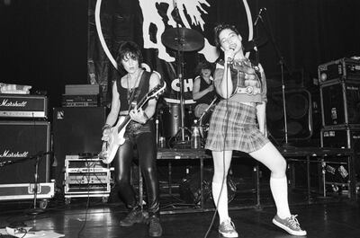 Kathleen Hanna, right, and drummer Tobi Vail, centre, of the group Bikini Kill, with Joan Jett, left, in New York City in 1994. Redferns