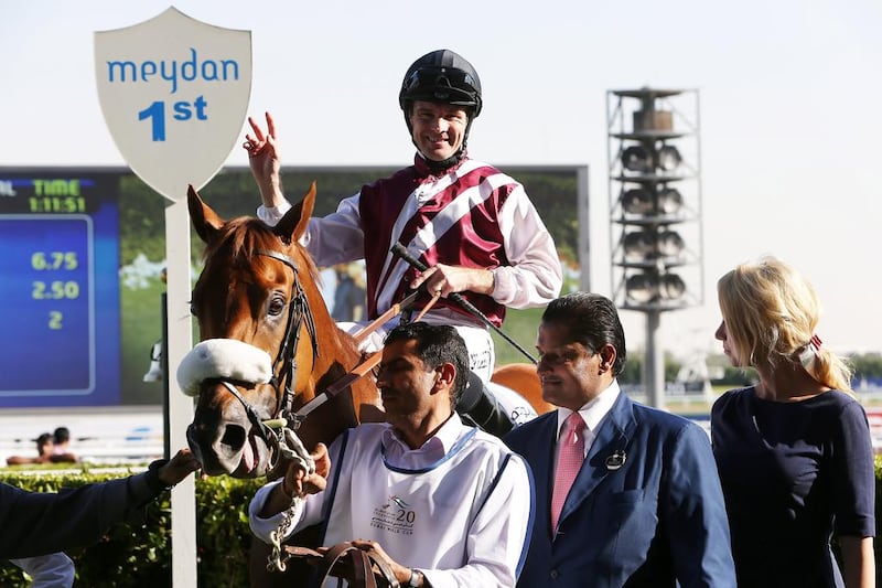 Jockey Richard Mullen celebrates another victory, this time aboard Satwa Story, at Meydan Racecourse on January 31. Pawan Singh / The National

