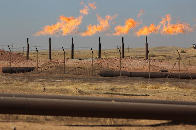 Gas is flared at the Bai Hassan oilfield near Kirkuk. Dana Gas says delayed collections in the Iraqi Kurdish region continue to be a challenge. AFP