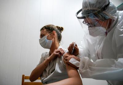 A medic of the regional hospital receives Russia's "Sputnik-V" vaccine shot against the coronavirus disease (COVID-19) in Tver, Russia October 12, 2020.  REUTERS/Tatyana Makeyeva