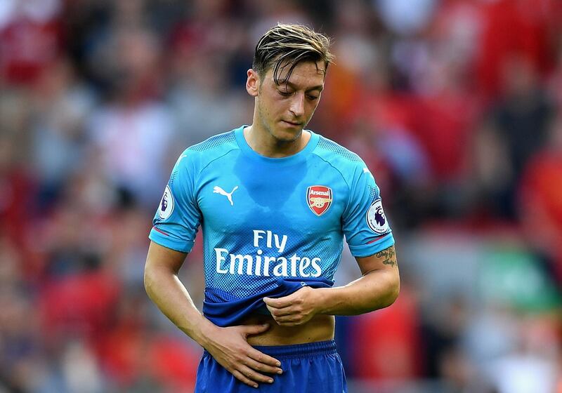 LIVERPOOL, ENGLAND - AUGUST 27:  Mesut Ozil of Arenal is dejected after the Premier League match between Liverpool and Arsenal at Anfield on August 27, 2017 in Liverpool, England.  (Photo by Michael Regan/Getty Images)