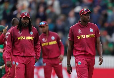 Cricket - ICC Cricket World Cup - West Indies v Bangladesh - The County Ground, Taunton, Britain - June 17, 2019   West Indies' Chris Gayle and Jason Holder look dejected at the end of the match    Action Images via Reuters/Paul Childs