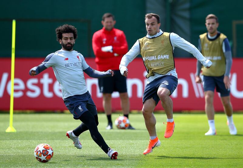 Liverpool's Mohamed Salah (left) and Xherdan Shaqiri during the press day at Melwood Training Ground, Liverpool. PA Wire.