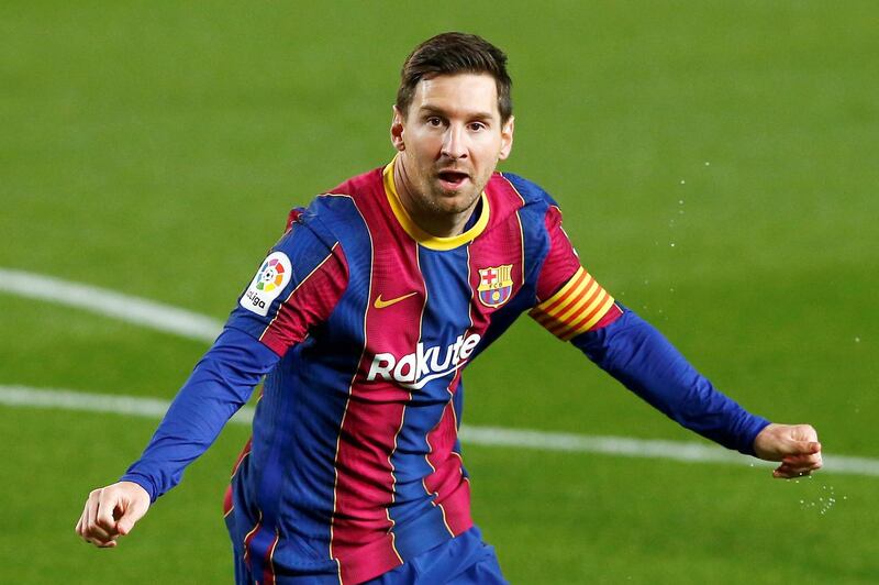 Barcelona's Lionel Messi celebrates after scoring the opening goal against Getafe at Camp Nou stadium in Barcelona on Thursday, April 22 , 2021. EPA