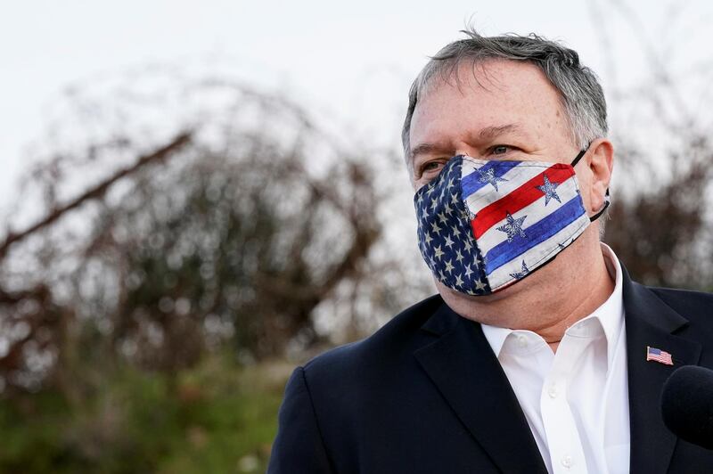 US Secretary of State Mike Pompeo listens as Israeli Foreign Minister Gabi Ashkenazi speaks after a security briefing on Mount Bental in the Israeli-occupied Golan Heights. Reuters