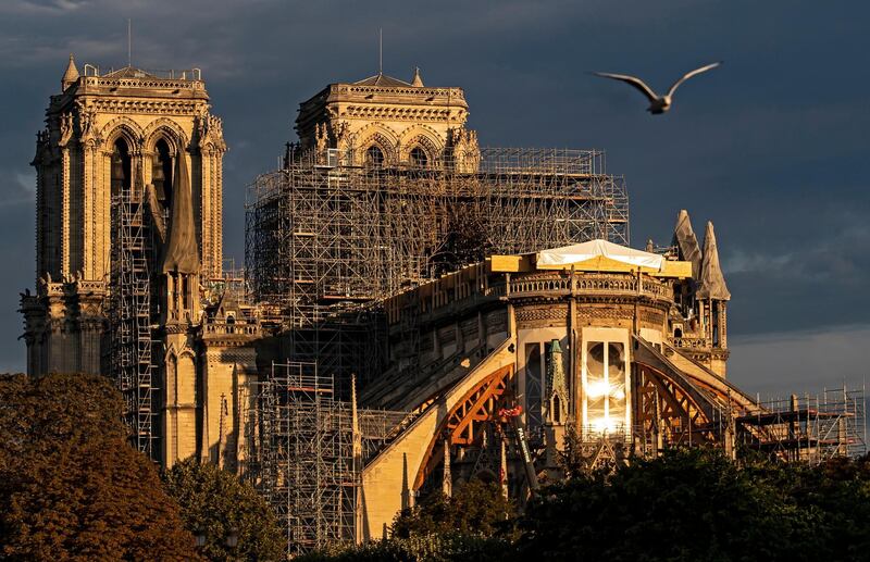 epa08086294 (FILE) - Early morning sunlight shines upon Notre-Dame Cathedral in Paris, France, 16 September 2019 (reissued 22 December 2019). French officials confirmed on 21 December that Notre-Dame will not hold the traditional Christmas mass for the first time since 1803, as workers continue to work on the cathedral eight months after the devastating fire that broke out on 15 April 2019.  EPA/IAN LANGSDON