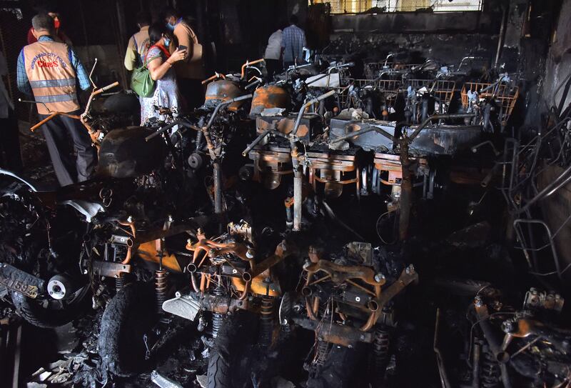 Burnt-out scooters in the showroom in Secunderabad after the fire on Tuesday. Reuters